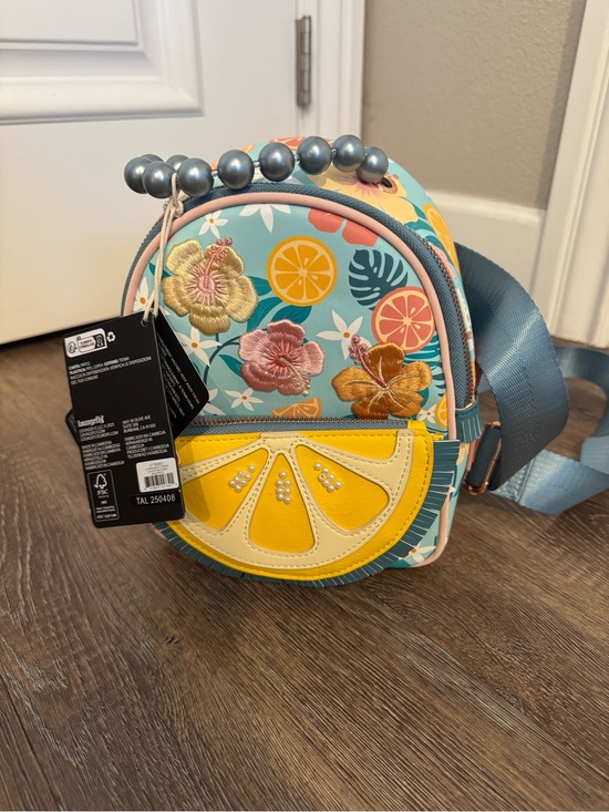 Loungefly Handbags - Loungefly Kids Floral Citrus Mini Backpack in Teal, Yellow & Pink